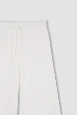 Стандартный крой, базовые спортивные штаны для бега с плоской талией, эластичные, широкие, длинные, из плотной ткани - Defacto фото 2