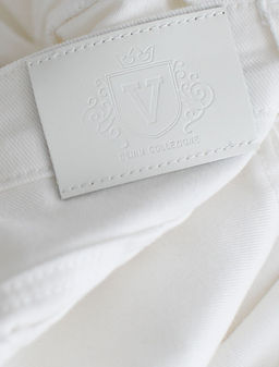 Джинсы клеш с прорезями и необработанным краем из эластичного денима средней плотности - Vilatte фото 6