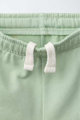 BERMUDA JOGGING TEXTO / Verde agua