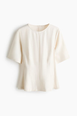 Blusa con peplum