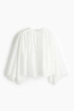 Blusa maxivolumen de ramio