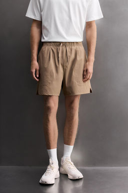 PANTALONES CORTOS T?CNICOS TRAINING / Marr?n claro