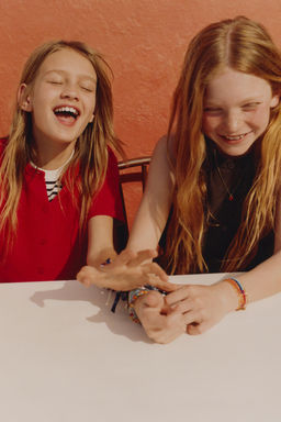 CHALECO PUNTO BOTONES / Marr?n