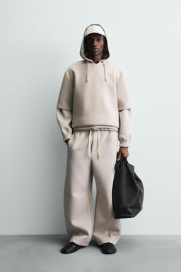 NEOPRENE-EFFECT BALLOON FIT TROUSERS - Zara фото 11