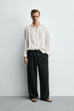 CAMISA POLO FLUIDA CORD?N / Blanco