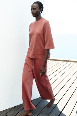 FADED WIDE-LEG TROUSERS
