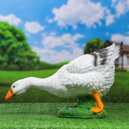 Садовая фигура из полистоуна «Гусь наклонившийся», 18×20×44 см
