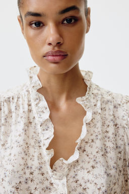 Blusa de volantes con mangas abullonadas - H&m фото 6