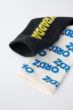 4-14 YEARS/ 2-PACK OF LONG SOCKS WITH TEXT