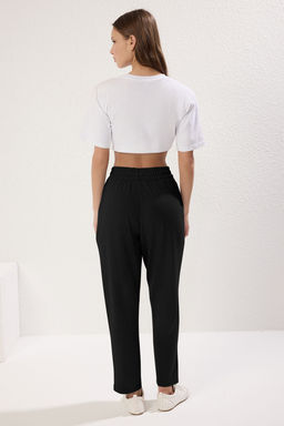 TRENDYOLMILLA Siyah Yumusak Tuseli Nervurlu Esnek Orme Pantolon TWOSS25PL00074  фото 4