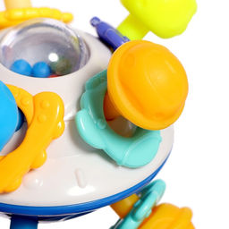 Развивающая игрушка - погремушка с прорезывателем для зубов «Летающая тарелка»
