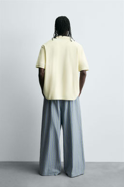 STRIPED OVERSIZE FIT TROUSERS