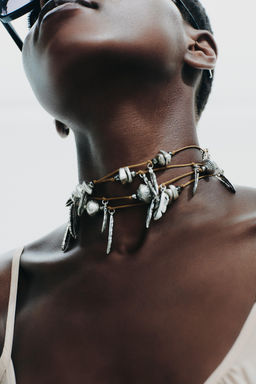 MULTI-POSITION CHARM CORD