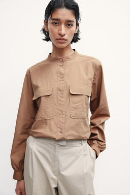Blusa con bolsillos