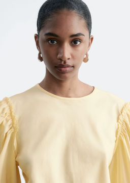 Blusa de jacquard con mangas globo