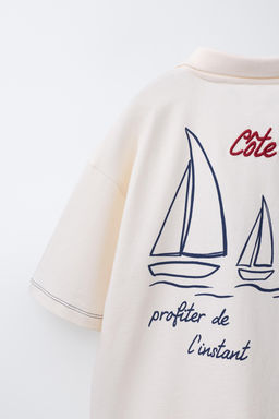 POLO ESTAMPADO TEXTO / Blanco