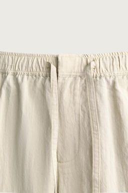 PANTAL?N T?CNICO RELAXED FIT EFECTO ARRUGADO / Beige - Zara фото 8