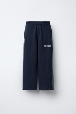 STRAIGHT-LEG PLUSH TROUSERS WITH SLOGAN