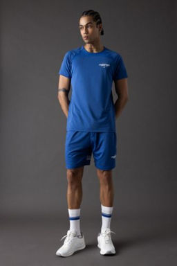 DeFactoFit Slim Fit Dar Kesim Sporcu K?sa Paca Sort