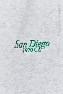 PLUSH JOGGING TROUSERS WITH SLOGAN - Zara фото 11