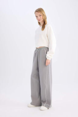 Классные широкие спортивные штаны с эластичной резинкой на талии