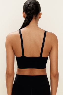 Sujetador de deporte en DryMove Medium Support - H&m фото 3