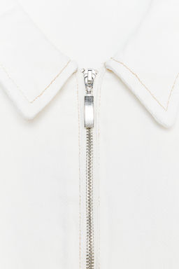 TOPSTITCHED WAISTCOAT WITH ELASTICATED HEM