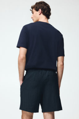 Pantal?n corto texturizado Relaxed Fit - H&m фото 9