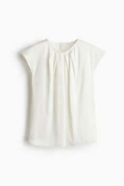 Blusa con pliegues