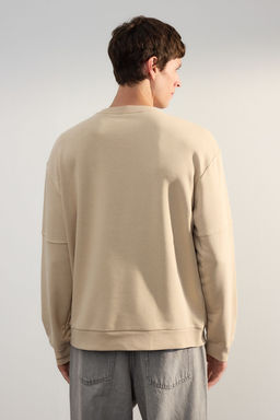 Tas Oversize/Genis Kesim Biyeli 100% Pamuk Sardonsuz Sweatshirt TMNAW25SW00034
