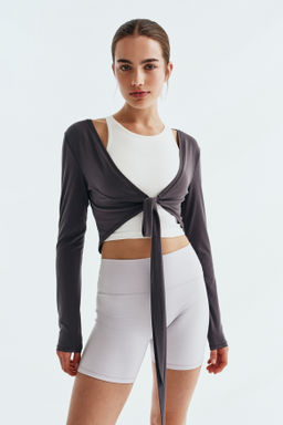 Top de yoga cropped con nudo decorativo SoftMove - H&m фото 6