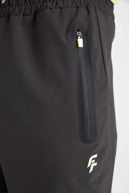 DeFactoFit Тканые спортивные штаны для бега стандартного кроя с двойными карманами  фото 6