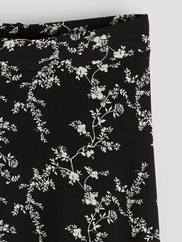 Beli Lastikli ?i?ekli A Kesim Etek