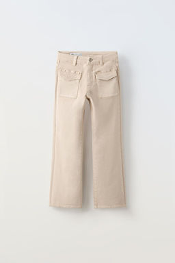 STUDDED BOOT-CUT JEANS