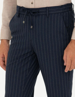 Темно-синие брюки узкого кроя из плотной ткани - Cacharel фото 6