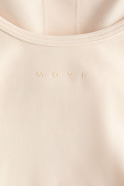 Top de deporte SoftMove con sujetador integrado - H&m фото 9