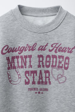 COWGIRL SLOGAN SWEATSHIRT