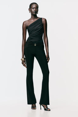 LEGGINGS WITH METAL APPLIQUE