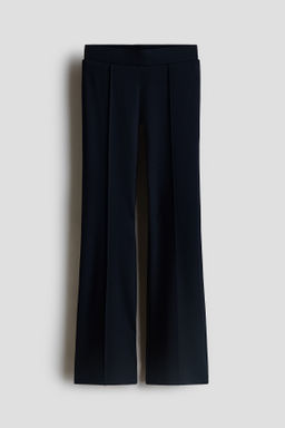 Leggings acampanados de punto