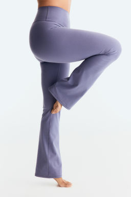 Leggings de yoga acampanados con SoftMove - H&m фото 14
