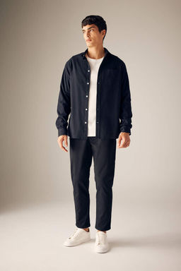 Брюки морковного кроя