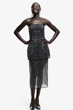 Falda de organza con detalles decorativos