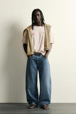 CAMISETA RELAXED FIT TEXTOS LAVADOS / Rosa