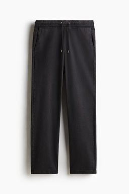 Pantal?n estilo ch?ndal efecto lavado Relaxed Fit