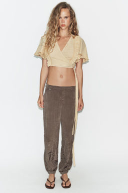 STRUCTURED CROSSOVER CROP TOP