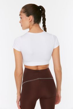 Beyaz Crop Hafif Destekli Yumusak Dokulu Bisiklet Yaka Orme Spor Ust/Bluz TWOAW21BZ0158