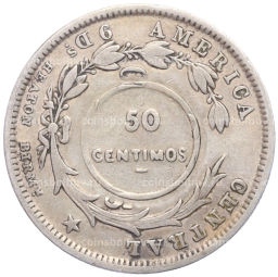 Монета 50 сентимо 1923 года надчекан на 20 сентимо 1893 года Коста-Рика