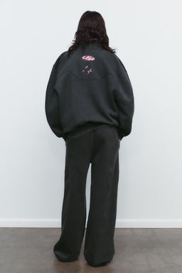 WASHED EFFECT PLUSH TROUSERS WITH SLOGAN - Zara фото 5