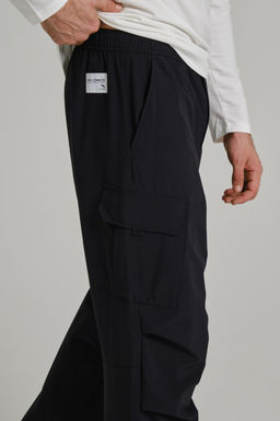 Брюки текстильные Черный COMMUTE Woven Track Pants - Anta фото 3