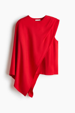 Blusa asim?trica con detalle de capa